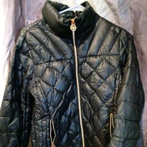 Michael Kors Light Weight Puffer Jacket. Size Large. Color is Black.